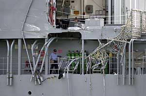 The damage aboard USS NICHOLSON.